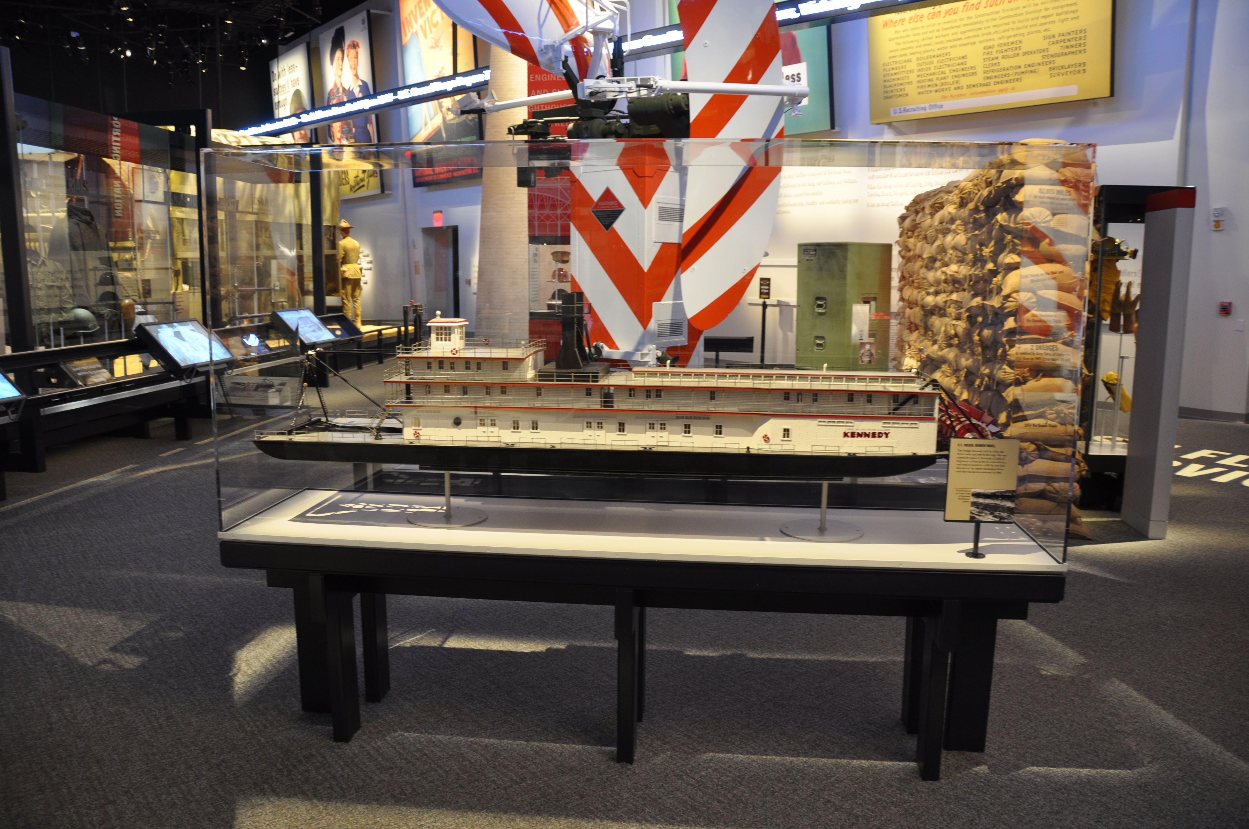 A scale model of a dredge under a case